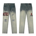 Amiri Black Distressed Logo Jeans