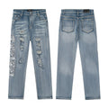 Amiri Light Wash Distressed Logo Jeans