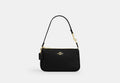 Coach Nolita 19 in refined pebble leather in Gold/Black