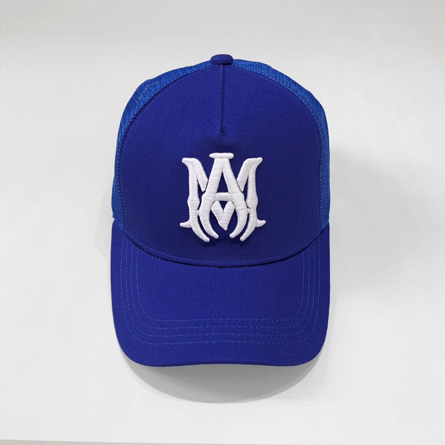 Amiri Blue Monogram Trucker Hat