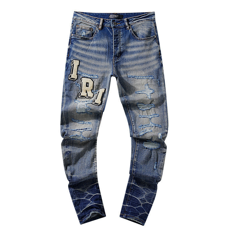 Amiri Distressed Front-Logo Light-Wash Jeans
